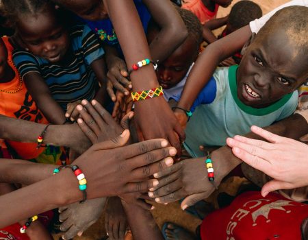 The children showing off their new bracelets